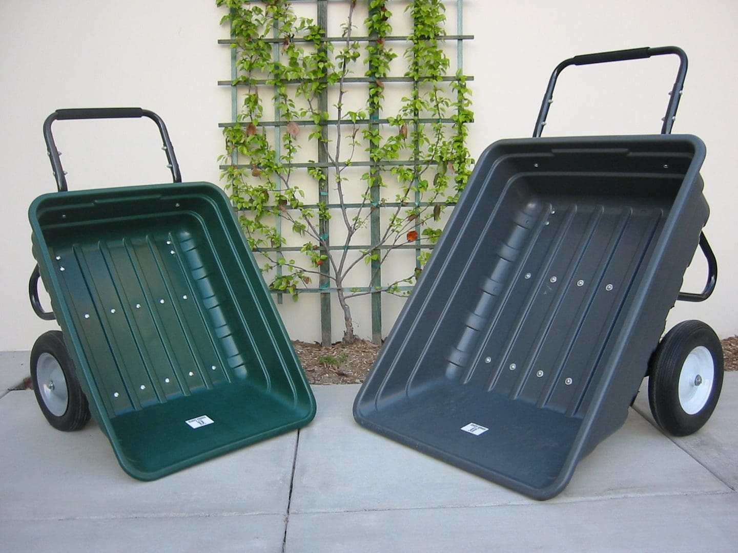 Easy Dump 11 CF Cart (Flat Free Tires) in use in a garden setting - Carts by Rugged Ranch